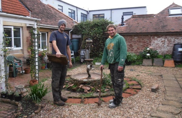 The cornerstone team working on a garden